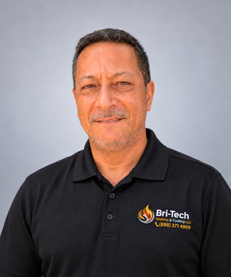 Headshot of a Bri-Tech Heating & Cooling team member wearing a black company polo